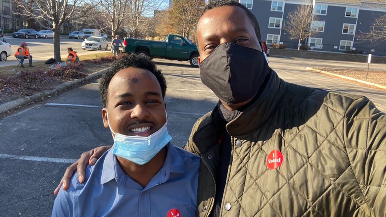 Suud Olat, 29, flew from Nairobi, Kenya to Minneapolist, Minnesota in order to vote this morning with friend, Abshir Omar. 