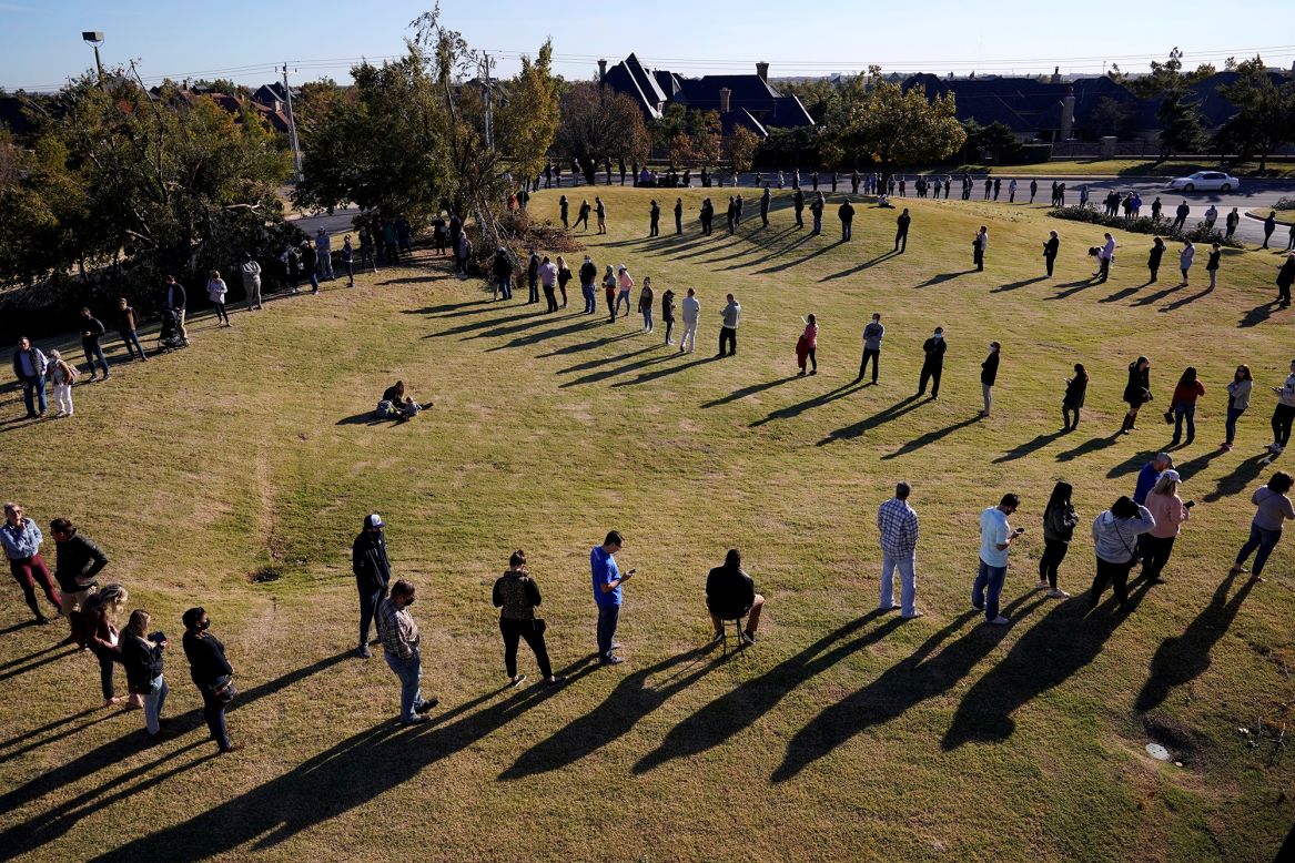 Voters in Oklahoma City wait to cast their ballots in the US presidential election on Tuesday, November 3.