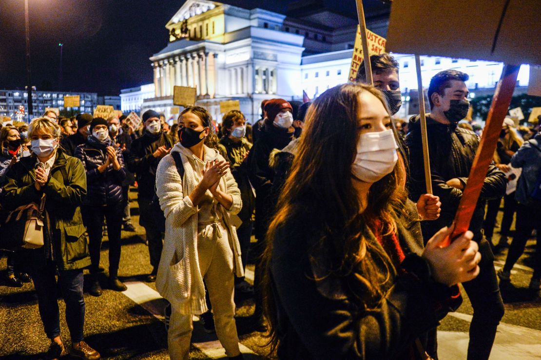 Crowds protest against the abortion ban in Warsaw on Tuesday.