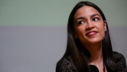 Rep. Alexandria Ocasio-Cortez (D-NY) takes questions during a Green New Deal For Public Housing Town Hall on December 14, 2019 in the Queens borough of New York City. 