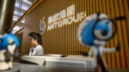 ATTENTION: This Image is part of a PHOTO SET.Mandatory Credit: Photo by ALEX PLAVEVSKI/EPA-EFE/Shutterstock (10792614ai)A woman works at the reception desk of the Ant Group headquarters in Hangzhou, China, 27 September 2020 (issued 28 September 2020). Ant Group is the parent company of China's largest mobile payments business Alipay and leading provider of financial services technology. The Alipay mobile application serves over 1 billion annual active users, according to the company. Ant group is an affiliate company of the Alibaba Group founded by billionaire Jack Ma and it is preparing a simultaneous initial public offering (IPO) in Hong Kong and Shanghai.Ant Group headquarters in Hangzhou, China - 27 Sep 2020