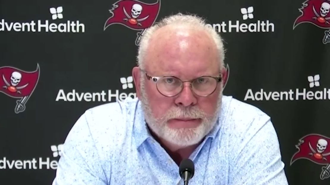 Arians speaks at a press conference. 