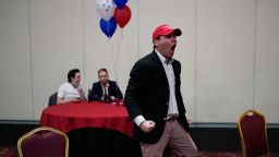 Donald Trump supporter John McGuinness celebrates while watching election returns in favor for Trump at a Republican election night watch party, Tuesday, Nov. 3, 2020, in Las Vegas. (AP Photo/John Locher)