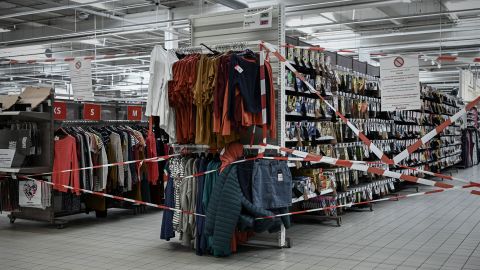 A notice is displayed at the closed clothing department of a supermarket in Bordeaux on Wednesday, on the sixth day of national lockdown.