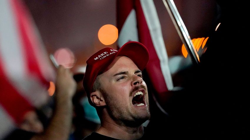 Supporters of President Donald Trump rally outside the Maricopa County Recorders Office, Wednesday, Nov. 4, 2020, in Phoenix. (AP Photo/Matt York)