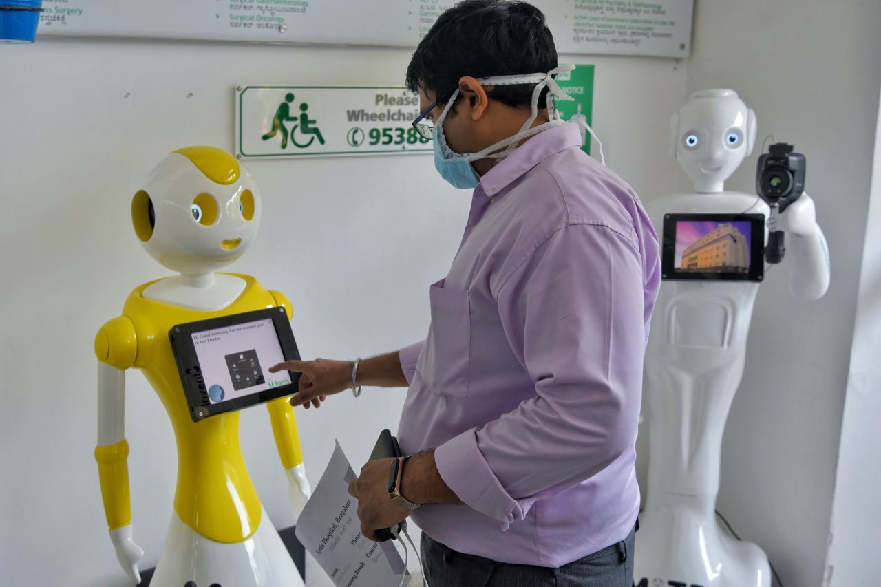 "Mitra," developed by Invento Robotics, at work at at Fortis hospital in Bangalore. <strong>Scroll through the gallery for more examples of robots that are doing good.</strong>