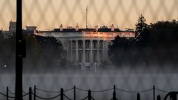 Fog surrounds the White House in Washington, D.C., U.S., on Thursday, Nov. 5, 2020. Joe Biden stood on the brink of claiming the presidency from Donald Trump on Thursday, with a handful of states expecting to complete their vote counts despite Republicans opening legal fights to stop counting in at least two states. Photographer: Stefani Reynolds/Bloomberg via Getty Images
