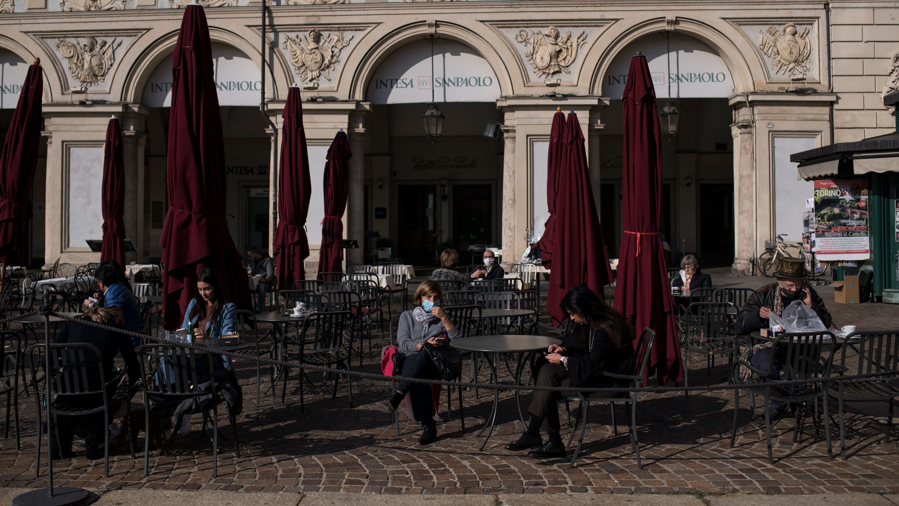 People wearing masks at Piazza San Carlo in Turin on Thursday, the last day before new lockdown measures for the Italian region of Piedmont.