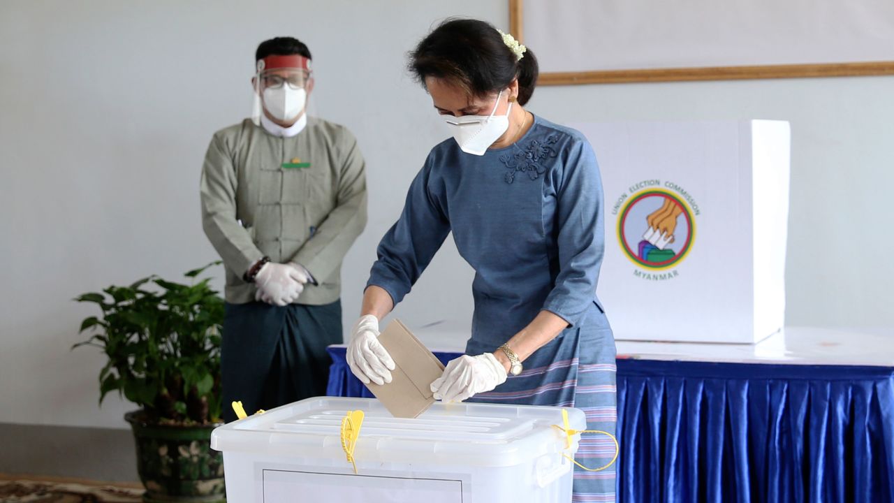 Myanmar's leader Aung San Suu Kyi makes an early voting for the general election at Union Election Commission office on October 29 in Naypyitaw.