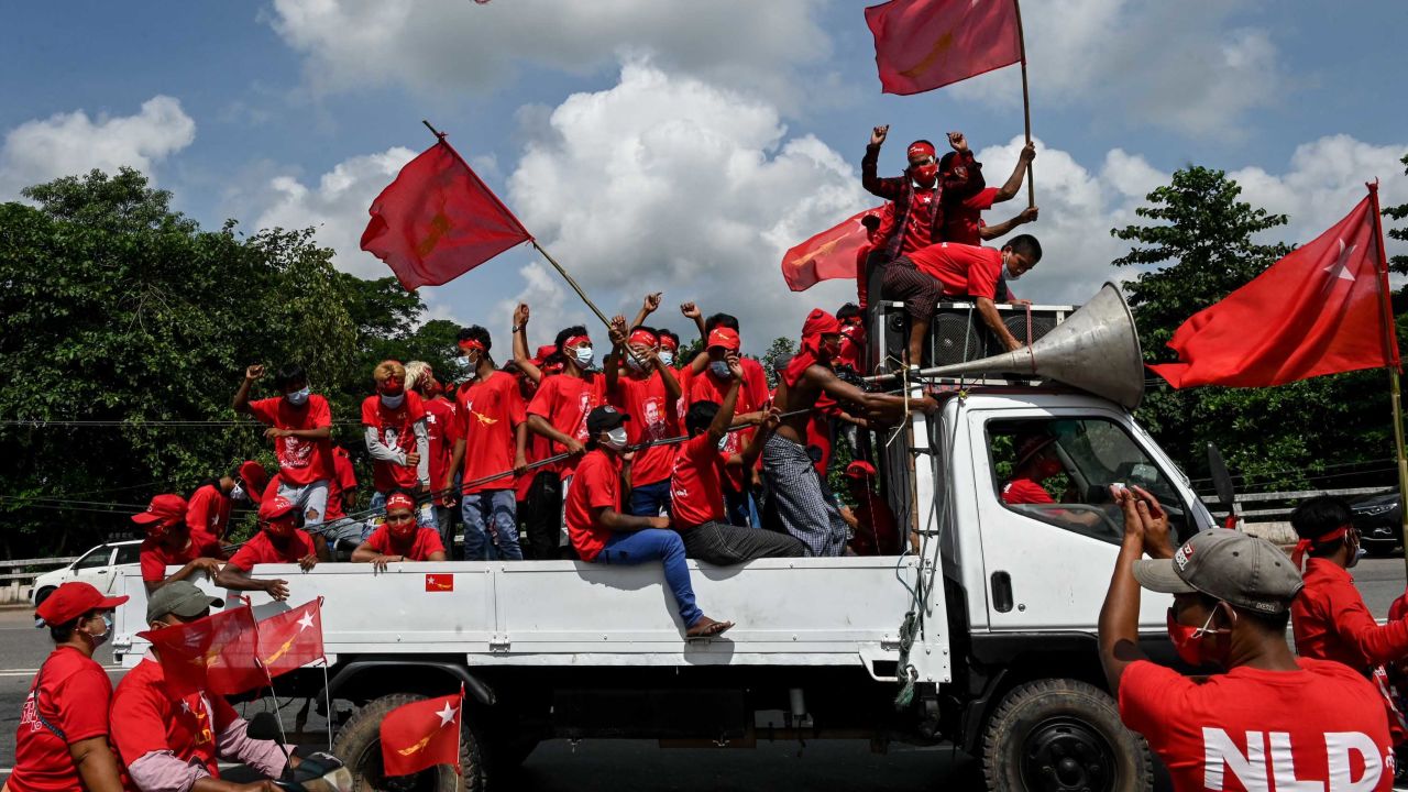 Supporters of the National League for Democracy (NLD) party take part in an election campaign rally on the outskirts of Yangon on October 25, 2020.