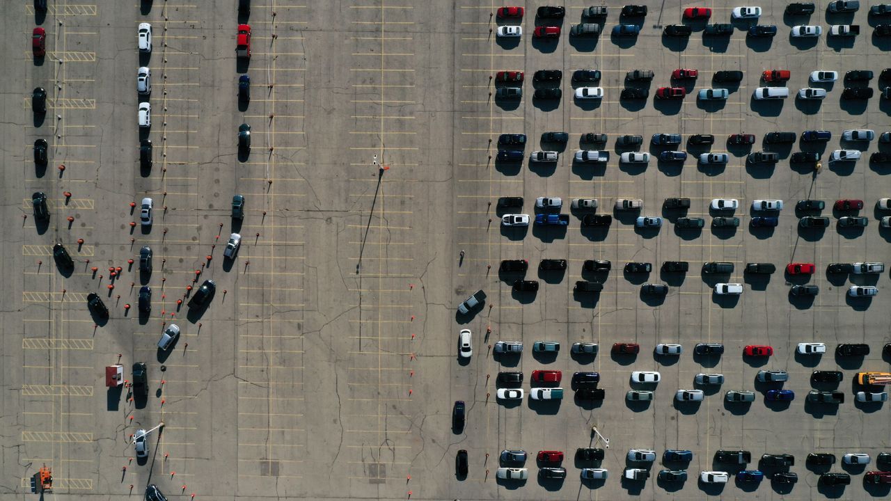 An aerial view of vehicles queuing at a drive-thru COVID-19 testing site at the Alliant Energy Center complex, as the coronavirus disease outbreak continues in Madison, Dane County, Wisconsin, on November 5, 2020.