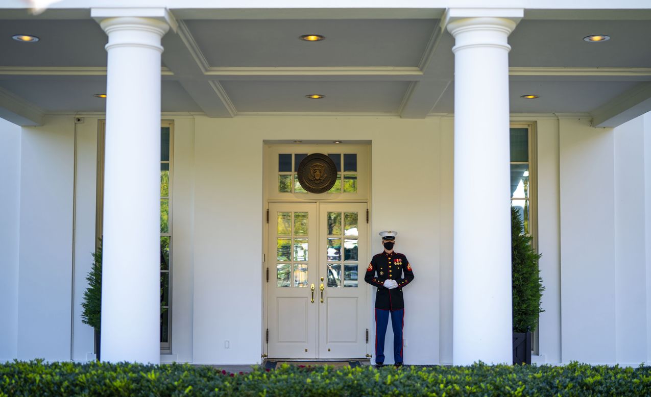 A US Marine is posted outside the West Wing entrance of the White House on Thursday, November 5, signaling that President Donald Trump was in the Oval Office.
