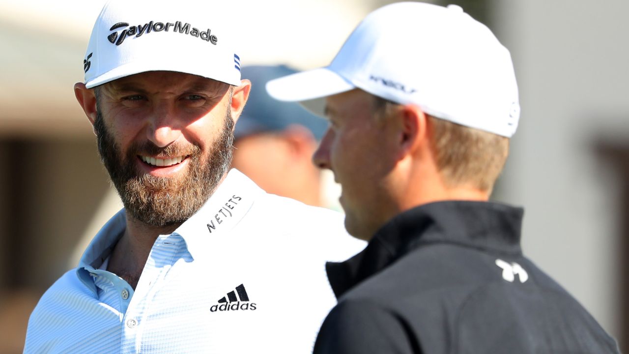 Johnson and Spieth talk together on the putting green ahead of the Houston Open.