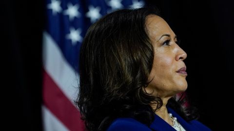 Harris listens to Biden speak during their first campaign event as a presidential ticket.