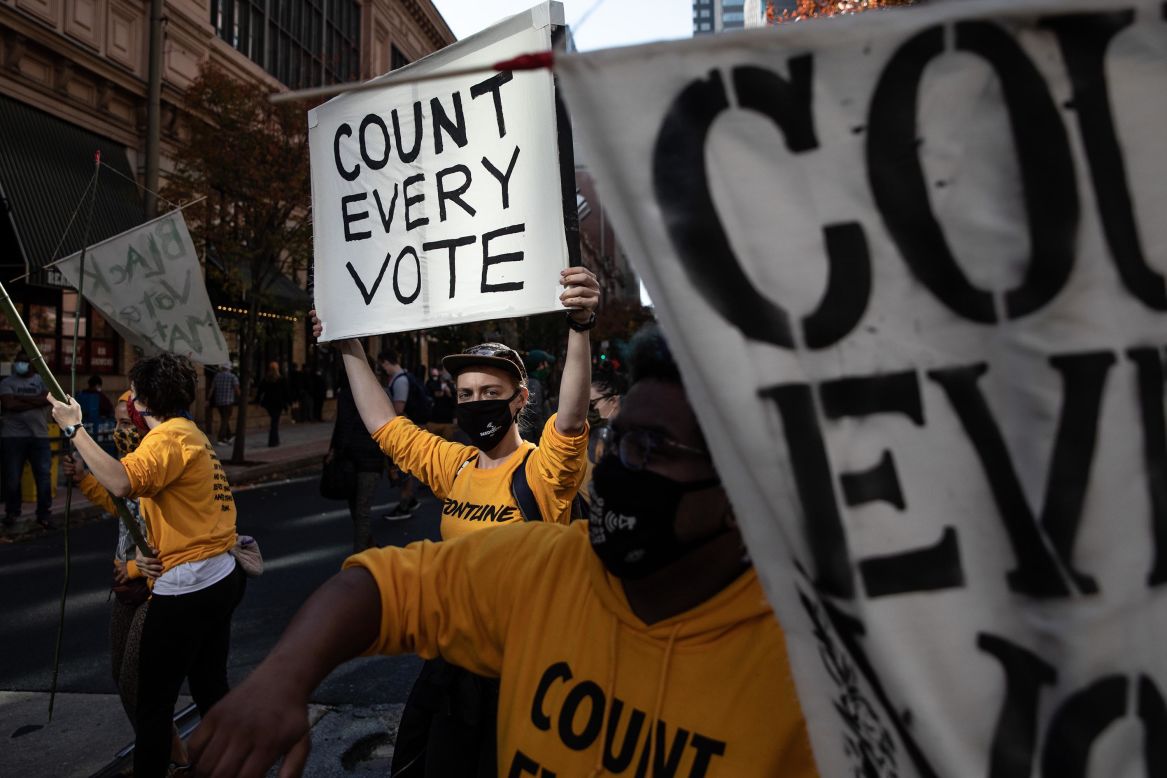 Protesters in Philadelphia show their support for vote counting on Thursday, November 5. Millions of votes were still being counted in the presidential election.