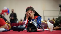 President Donald Trump supporter Loretta Oakes reacts while watching returns in favor of Democratic presidential candidate former Vice President Joe Biden, at a Republican election-night watch party, Tuesday, Nov. 3, 2020, in Las Vegas. (AP Photo/John Locher)