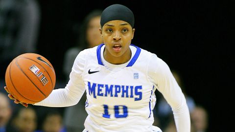 Bilqis Abdul-Qaadir, Memphis Lady Tigers guard at the time, dribbling the ball up the court against the Tulane Green Wave.