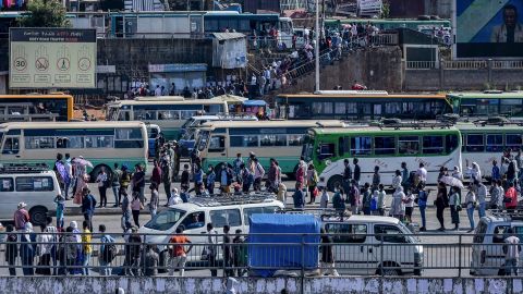 Passengers queue to get on buses in Addis Ababa, Ethiopia on November 6.