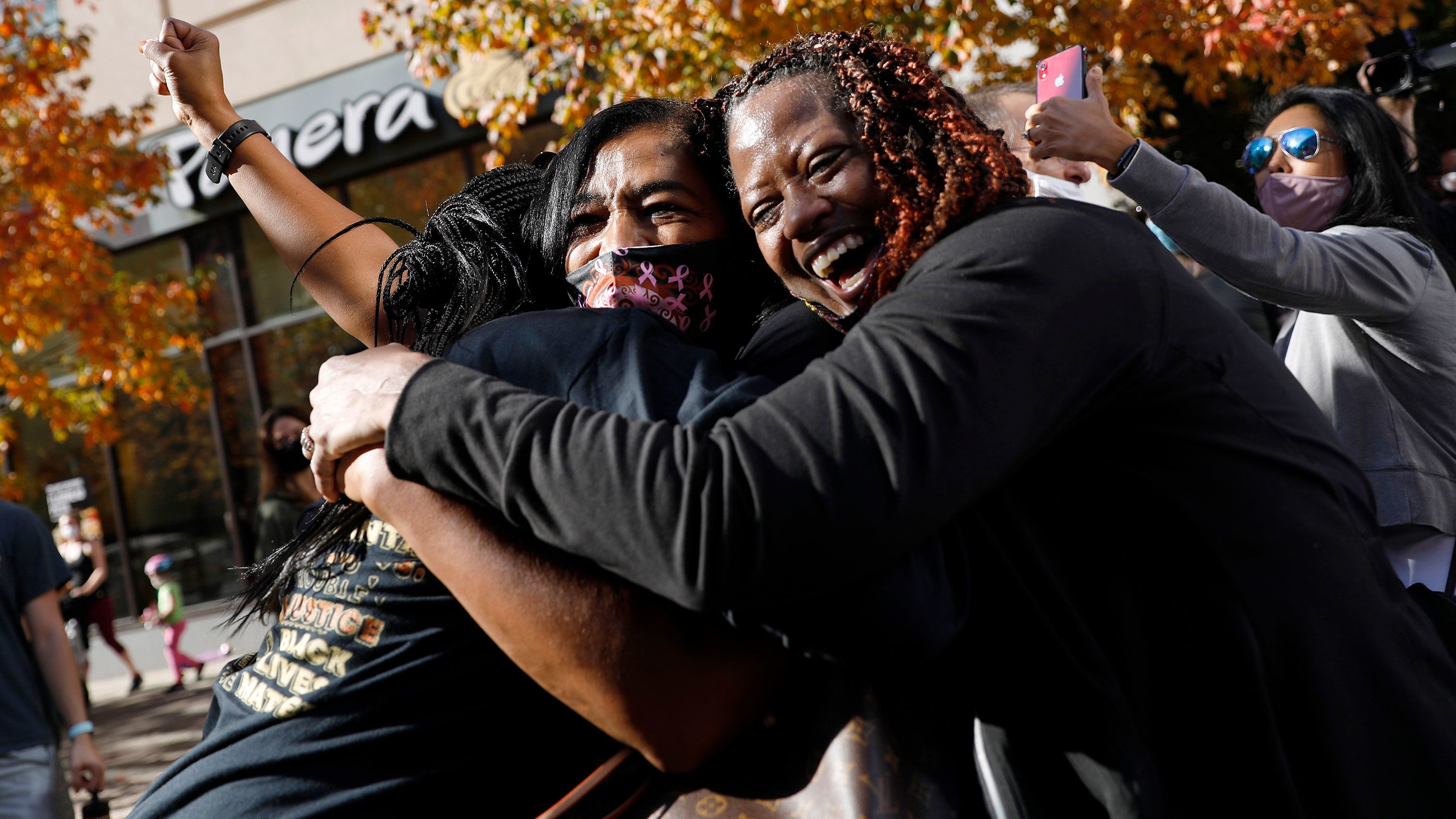 People celebrate in Philadelphia after Joe Biden was projected to win the presidential election on Saturday, November 7.