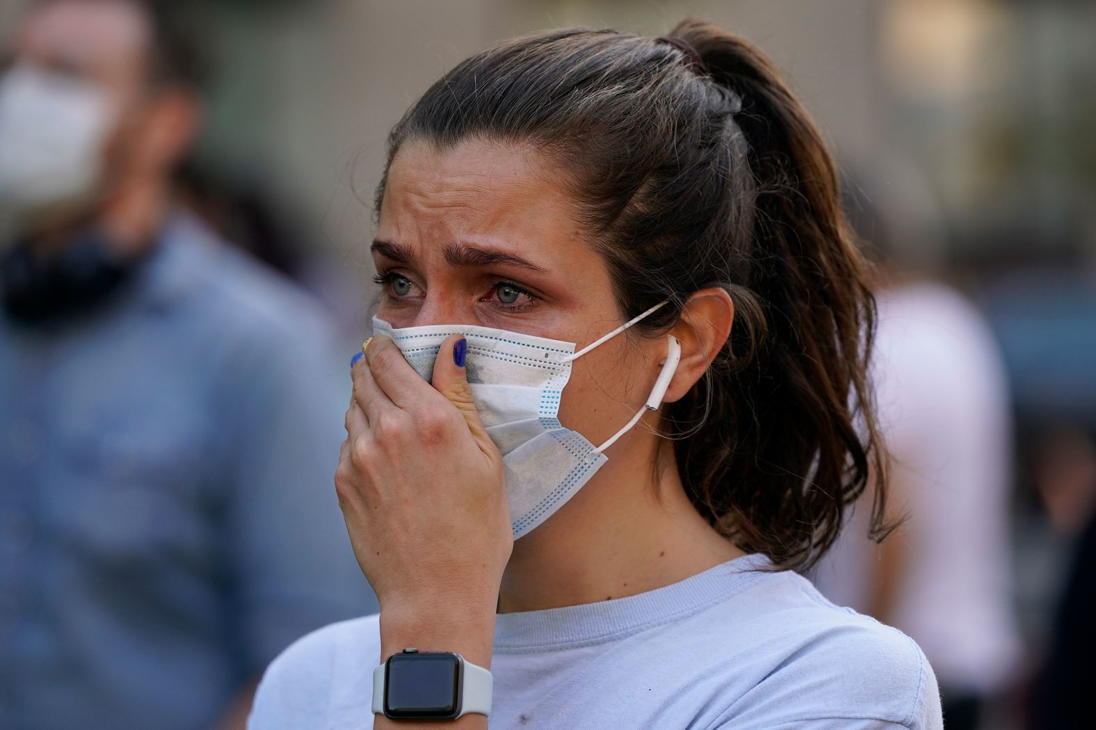 Olivia Cox reacts to Biden's win at the Black Lives Matter Plaza in Washington, DC.