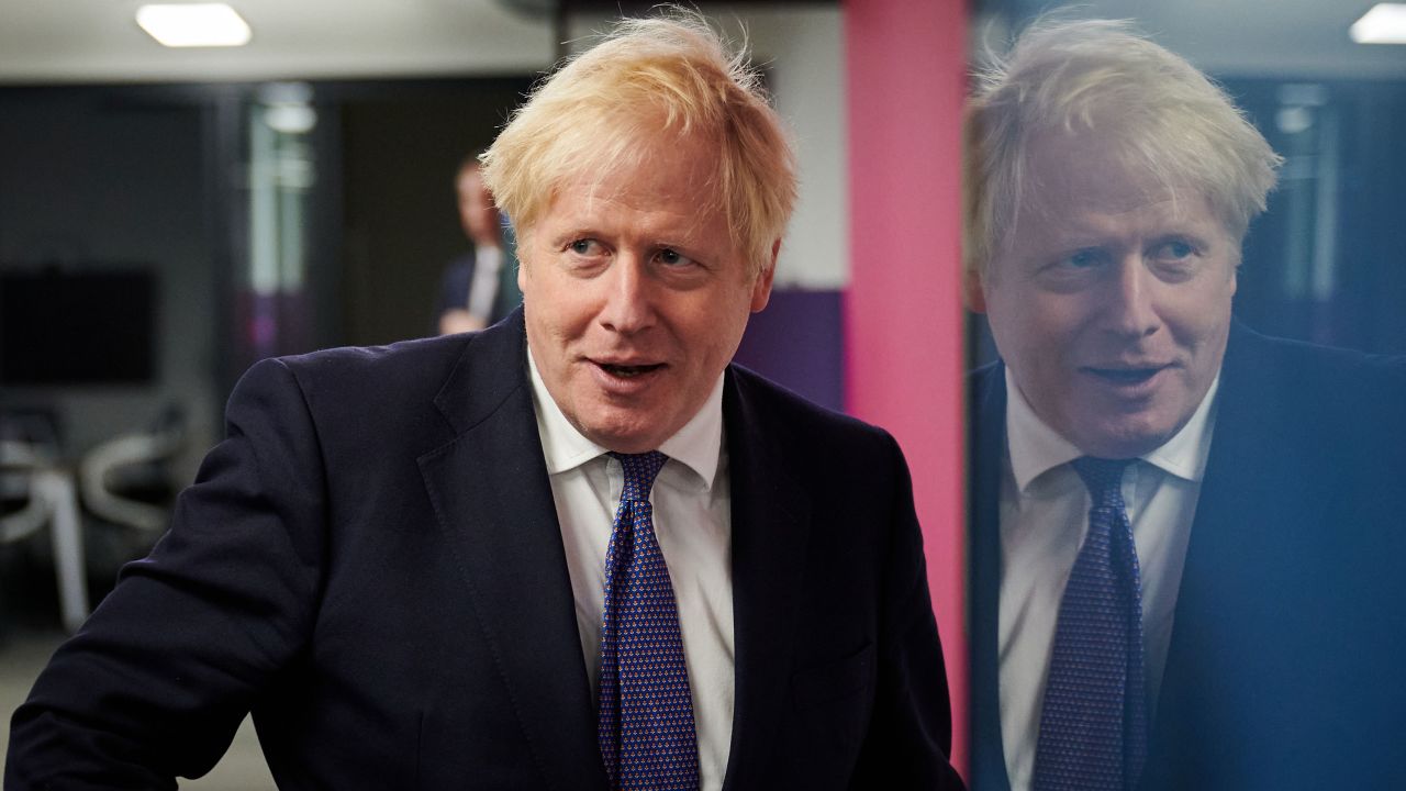 UK Prime Minister Boris Johnson visits the headquarters of Octopus Energy on October 5 in London