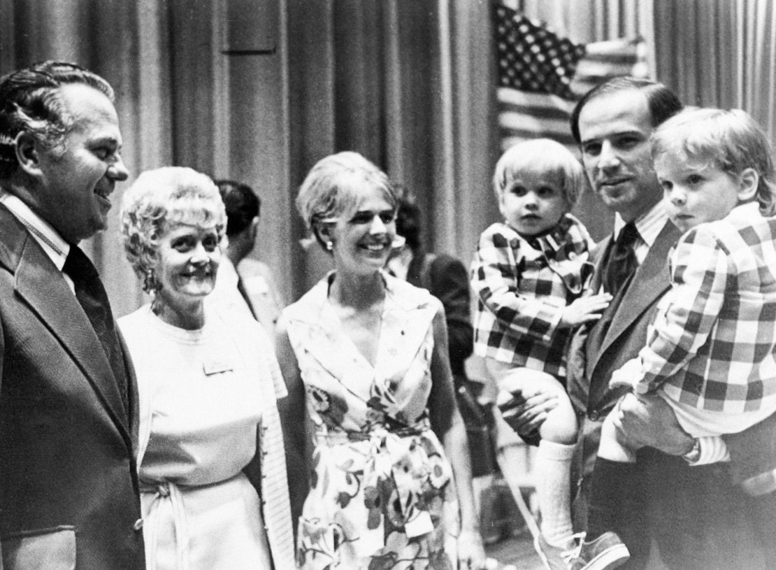 Biden carries his sons Beau, left, and Hunter while attending a Democratic convention in Delaware in 1972. At center is his wife Neilia Biden, who was killed in an auto crash, December 20, 1972. With them are Gov.-elect Sherman W. Tribbitt and his wife, Jeanne.