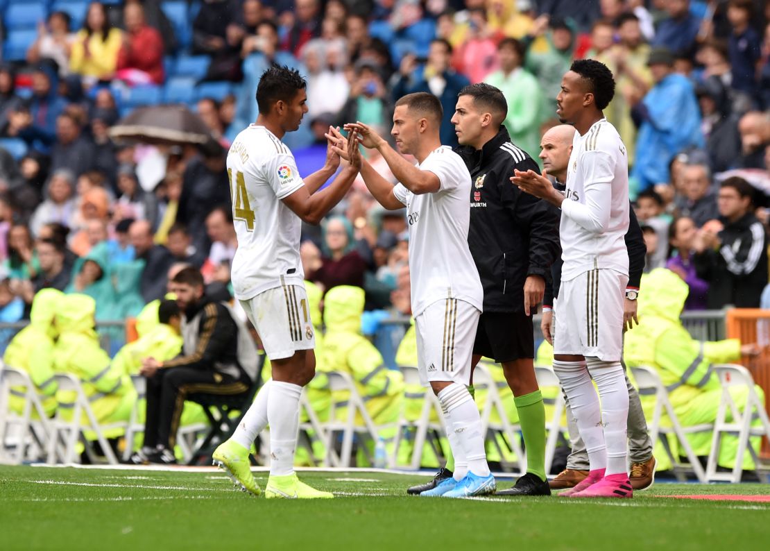 Eden Hazard replaces Casemiro during the La Liga match between Real Madrid and Levante UD at the Estadio Santiago Bernabeu on September 14, 2019 in Madrid, Spain.