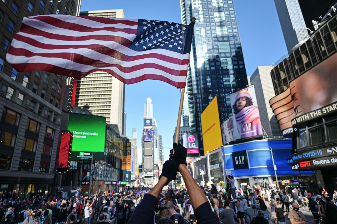 New Yorkers gather in Times Square to celebrate Biden's win.