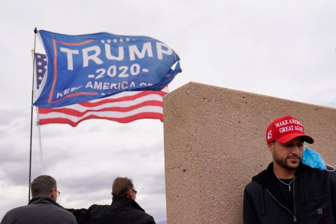 Trump supporters stand outside of the Clark County Elections Department in North Las Vegas, Nevada, on November 7.