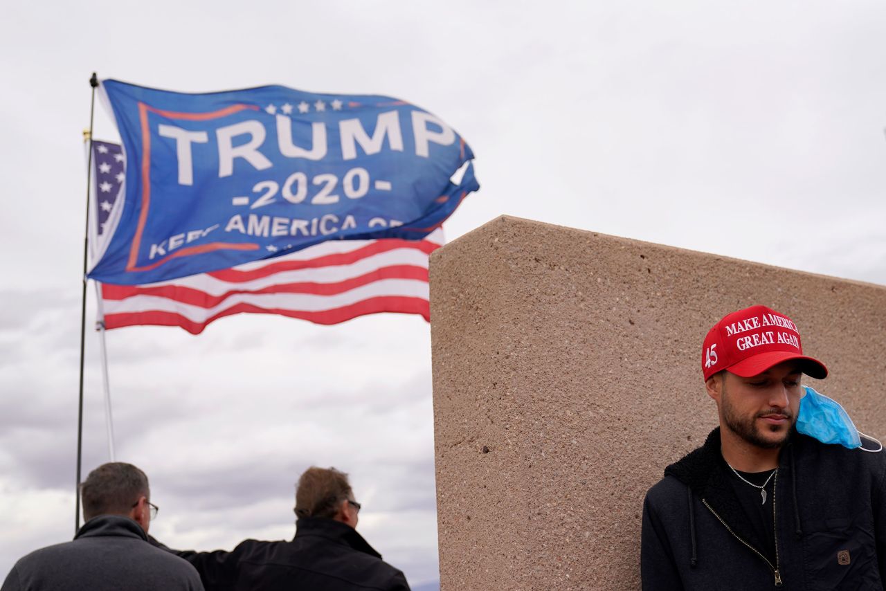 Trump supporters stand outside of the Clark County Elections Department in North Las Vegas, Nevada, on November 7.