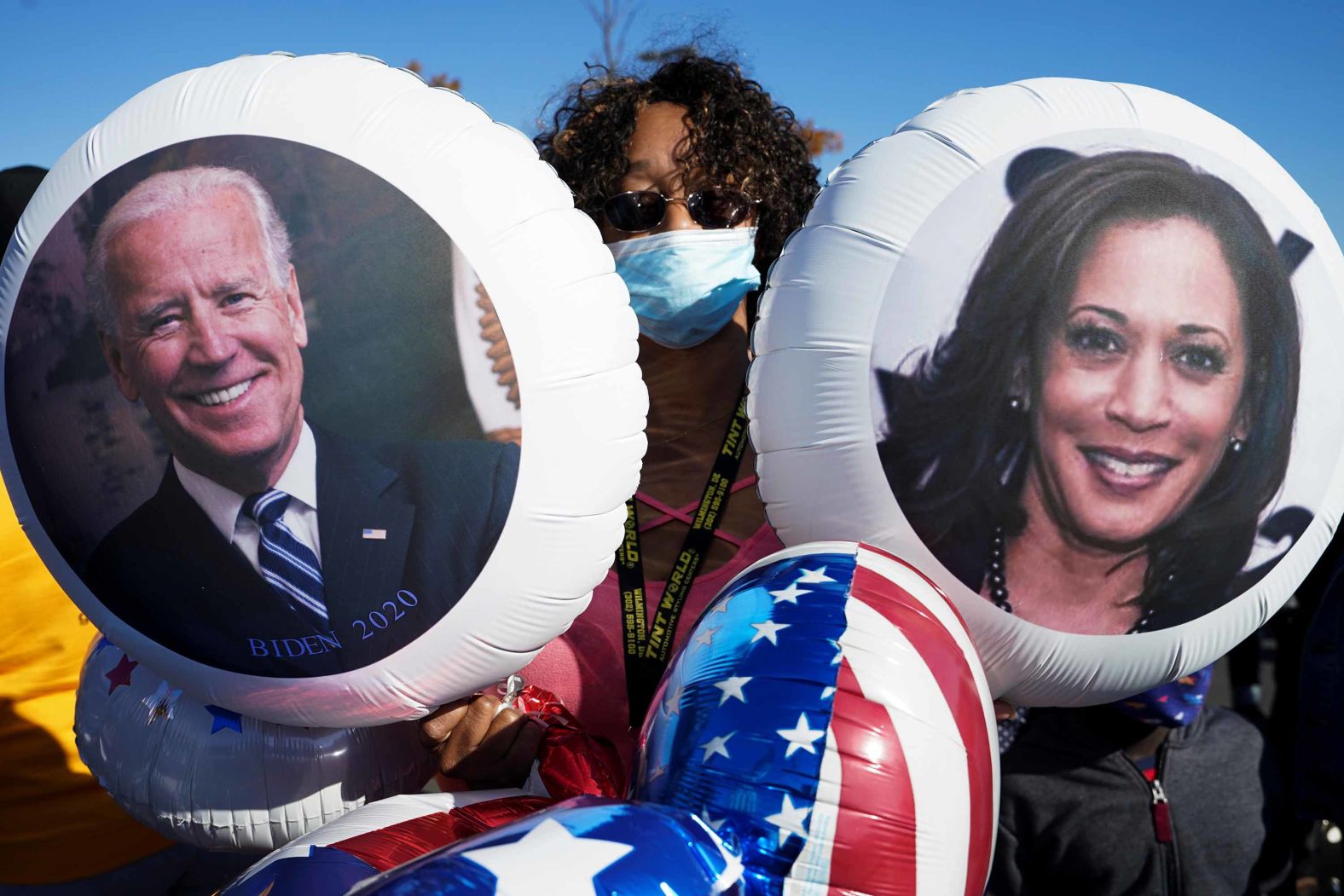 A Biden supporter holds balloons at the site of a victory party in Wilmington, Delaware.