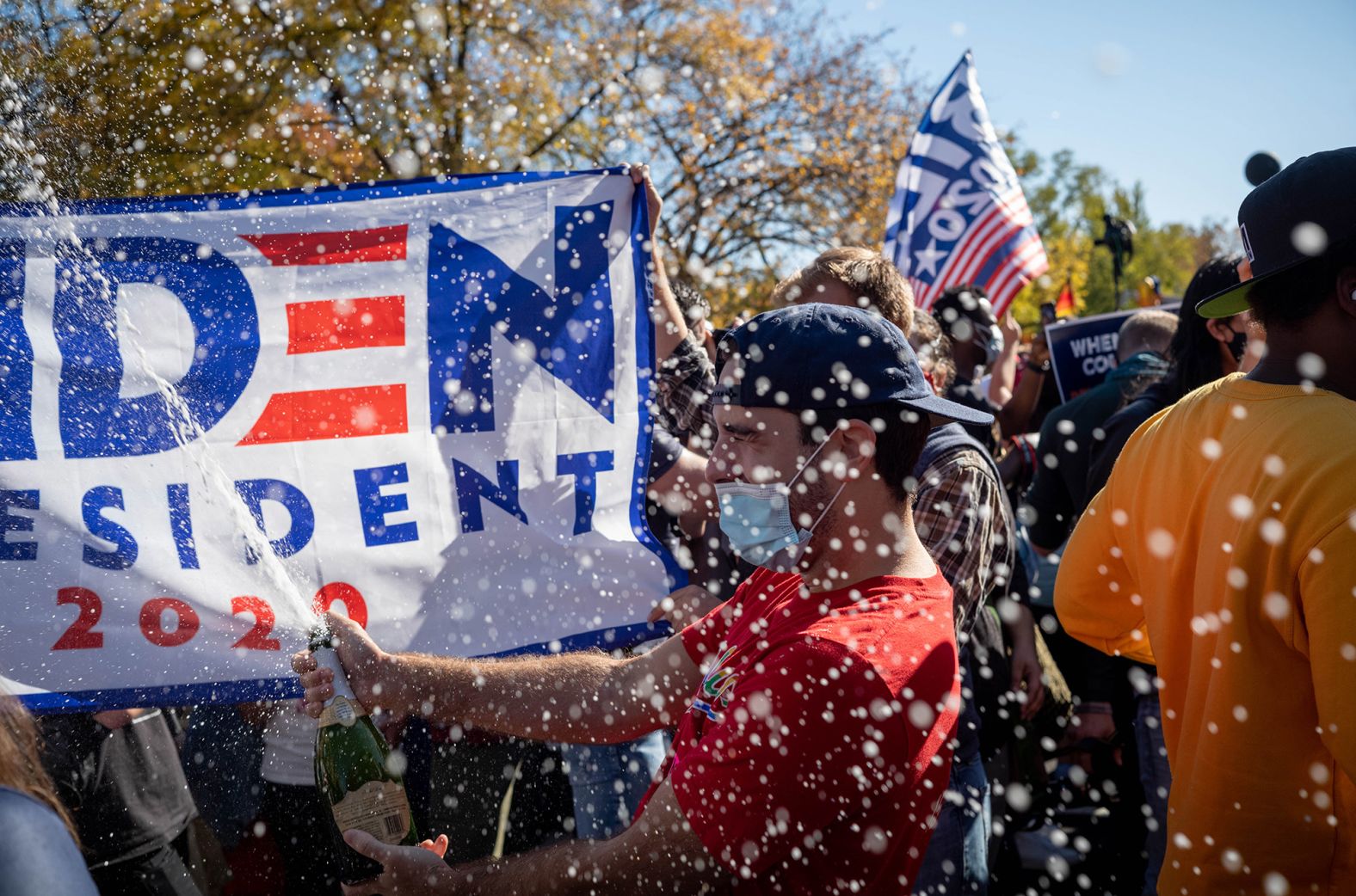 People celebrate at the Black Lives Matter Plaza in Washington, DC.