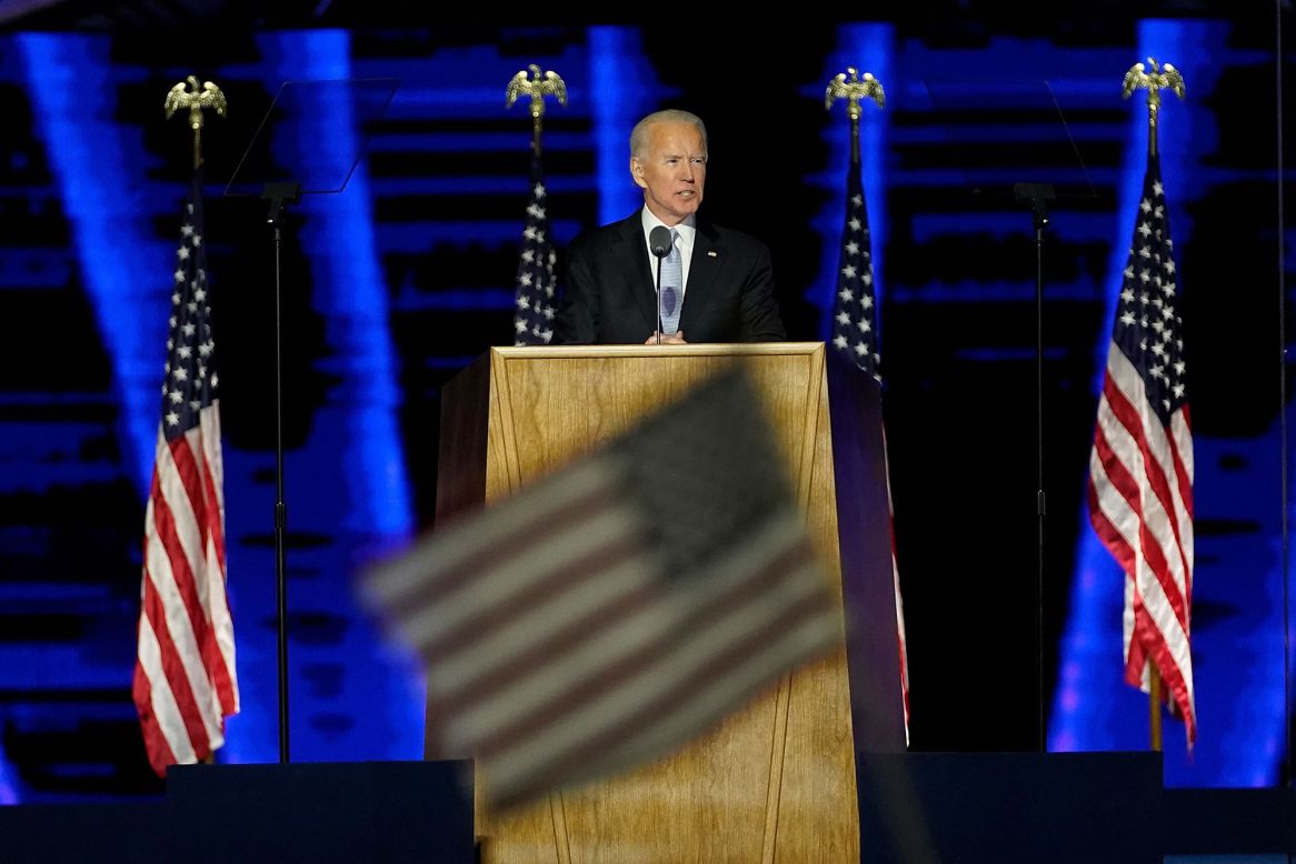 US President-elect Joe Biden gives his victory speech in Wilmington, Delaware, on Saturday, November 7. "Tonight the whole world is watching America, and I believe that at our best, America is a beacon for the globe," Biden said. "We will lead not only by the example of our power, but by the power of our example."