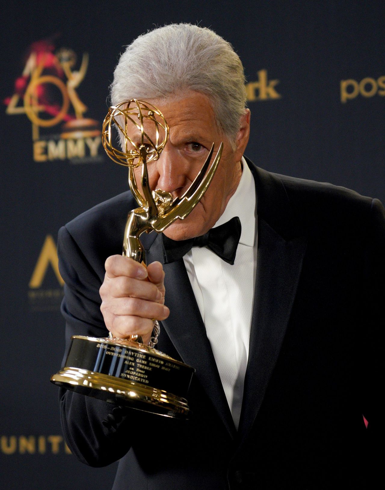 Trebek kisses his Emmy at the 46th Annual Daytime Emmy Awards show in Los Angeles on May 5, 2019.