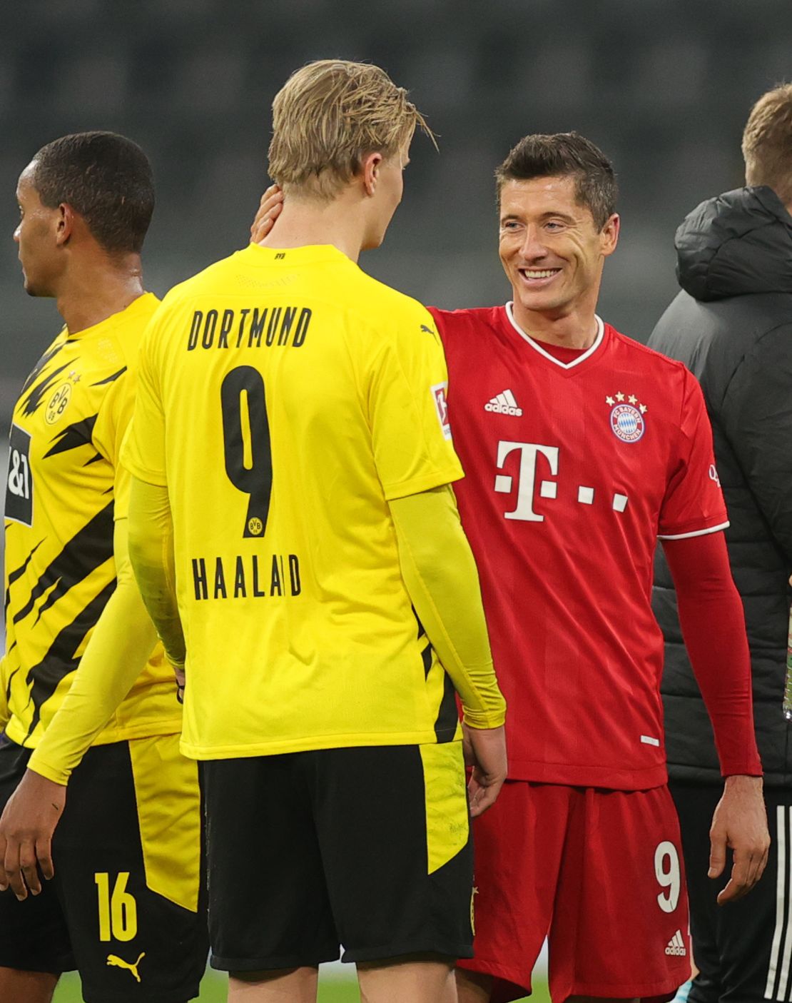 Erling Haaland of Dortmund and Robert Lewandowski Bayern Munich chat after the Bavarian club's 3-2 win at Signal Iduna Park.