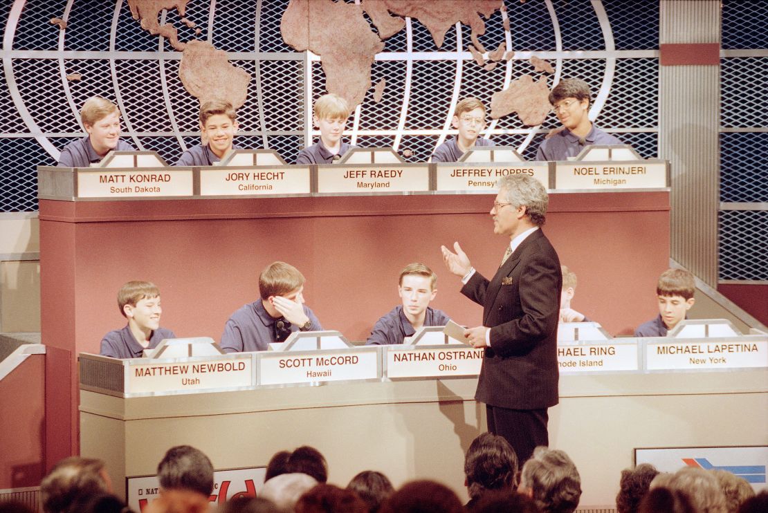 Host Alex Trebek talks to the 10 finalists in the fifth annual National Geography Bee in Washington, DC, on May 26, 1993.