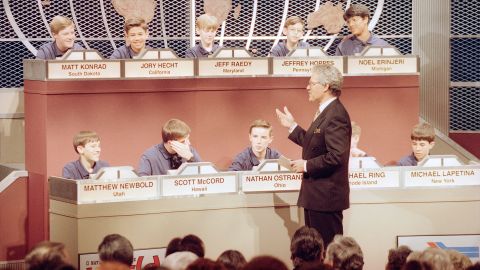 Host Alex Trebek talks to the 10 finalists in the fifth annual National Geography Bee in Washington, DC, on May 26, 1993.