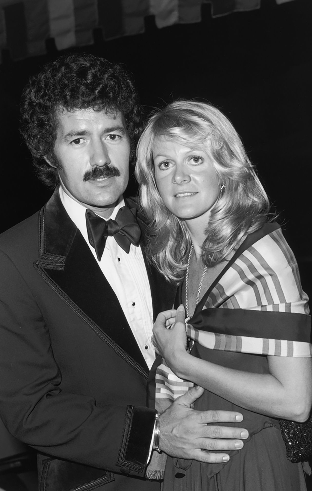 Trebek stands with his wife Elaine Callei at the annual Thalian Ball in California in 1976. Trebek married broadcaster Callei in 1974. They divorced in 1981.