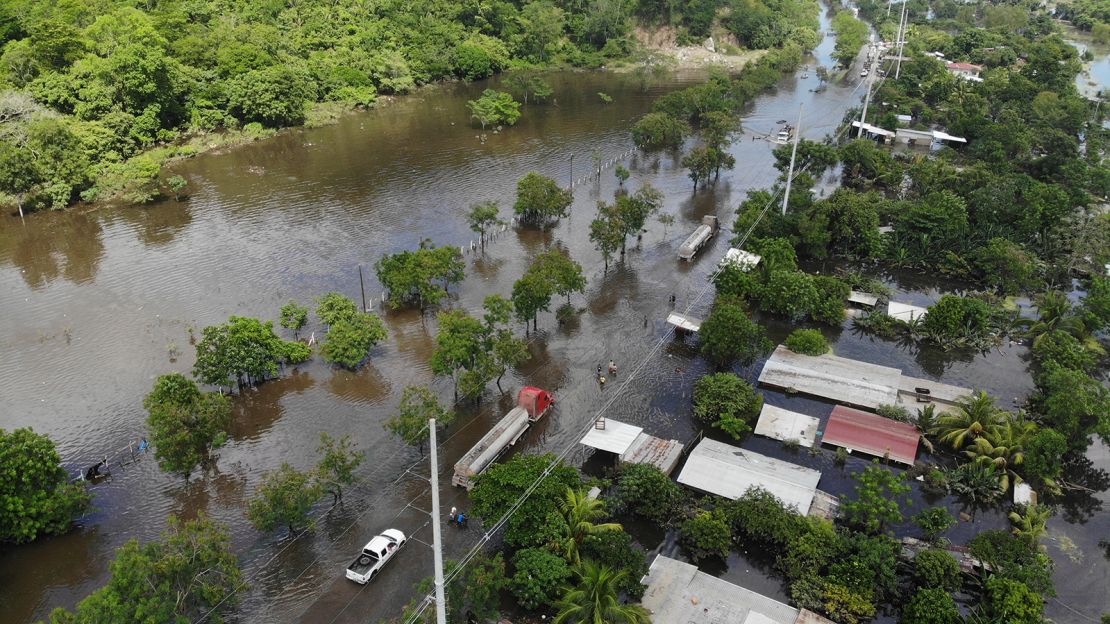  A community road leading to Puerto Cortes, Honduras, is seen after it was flooded by tropical storm Eta.