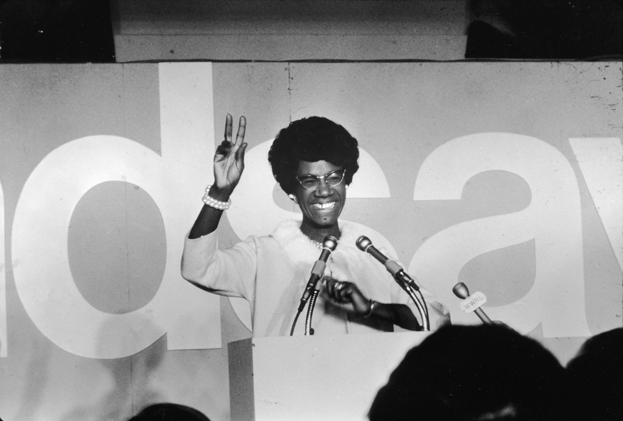 Shirley Chisholm, the first African American woman to be elected to Congress, dressed in all-white.
