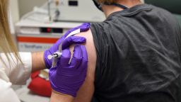 This May 4, 2020, file photo provided by the University of Maryland School of Medicine, shows the first patient enrolled in Pfizer's COVID-19 coronavirus vaccine clinical trial at the University of Maryland School of Medicine in Baltimore.  