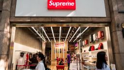 SHANGHAI, CHINA - 2019/09/07: Pedestrians walk past an American skateboarding shop and clothing brand Supreme store in Shanghai. (Photo by Alex Tai/SOPA Images/LightRocket via Getty Images)