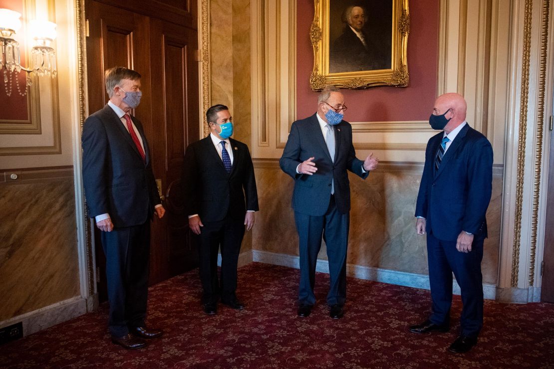 Senate Minority Leader Chuck Schumer, D-N.Y., center right, meets with Sen.-elect John Hickenlooper, D-Colo., left, Sen.-elect Ben Ray Luján, D-N.M.,and Sen.-elect Mark Kelly, D-Ariz, in Washington on Monday, November 9.