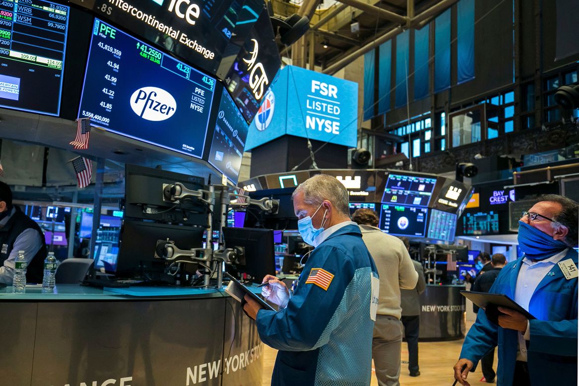Traders work on the floor of the New York Stock Exchange on Monday, November 9. <a href="https://www.cnn.com/2020/11/09/investing/dow-stock-market-today/index.html" target="_blank">Stocks surged on Monday</a> after Pfizer said its Covid-19 vaccine was 90% effective. Even before that news, stock futures had been pointing to a higher open after Joe Biden was projected to be the next president of the United States.