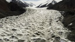 Meltwater flows over the Laohugou No. 12 glacier in the Qilian mountains, Subei Mongol Autonomous County, in Gansu province, China, on September 27, 2020. 