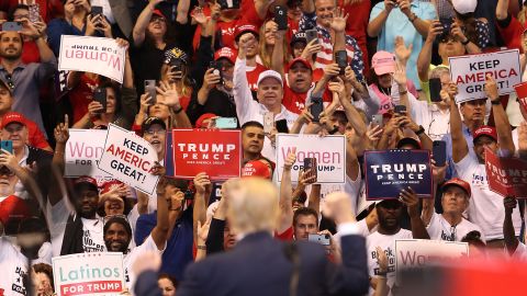 People cheer as they listen to President Donald Trump speak during a homecoming campaign rally at the BB&T Center on November 26, 2019 in Sunrise, Florida. 