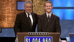 CULVER CITY, CA - JULY 14:  Jeopardy host Alex Trebek, (L) poses contestant Ken Jennings after his earnings from his record breaking streak on the gameshow surpassed 1 million dollars July 14, 2004 in Culver City, California.  (Photo by Jeopardy Productions via Getty Images) 