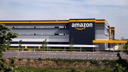BRETIGNY-SUR-ORGE, FRANCE - APRIL 21: The logo of Amazon is seen on the facade of the company logistics center on April 21, 2020 in Bretigny-sur-Orge, France. The French government has ordered the American e-commerce giant Amazon to take measures at four of its sites in France to better protect employees against Covid-19. This Tuesday, the Versailles Court of Appeal examined the appeal filed by Amazon against a decision requiring it to restrict its activity in France during this period of confinement. Amazon Logistique France has finally decided to close all of its warehouses pending the decision of the Versailles Court of Appeal, which will be made on Friday April 24. The Coronavirus (COVID-19) pandemic has spread to many countries across the world, claiming over 171,000 lives and infecting over 2.5 million people. (Photo by Chesnot/Getty Images)