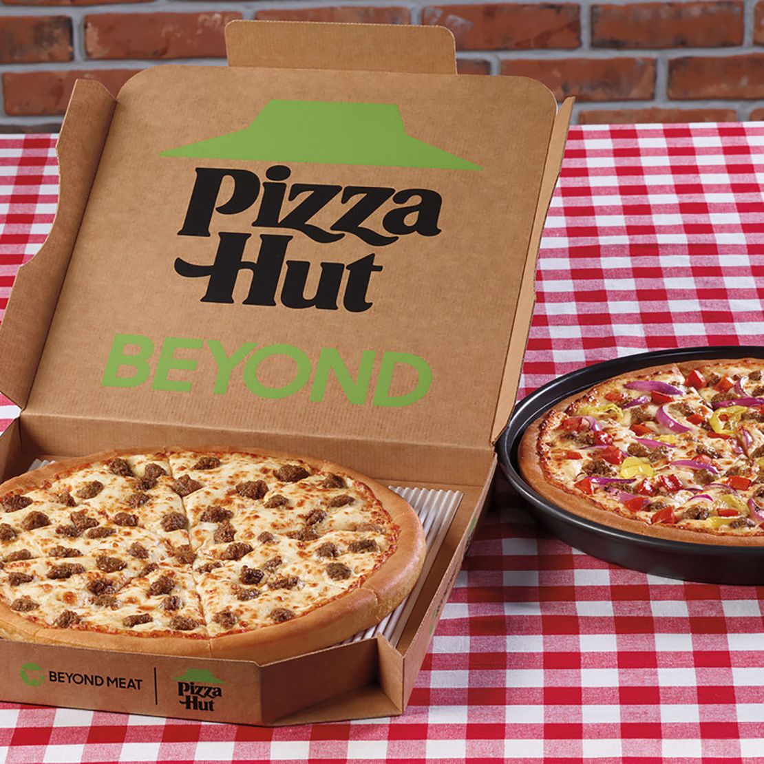 Pizza Hut's Beyond Italian Sausage Pizza and the Great Beyond Pizza.