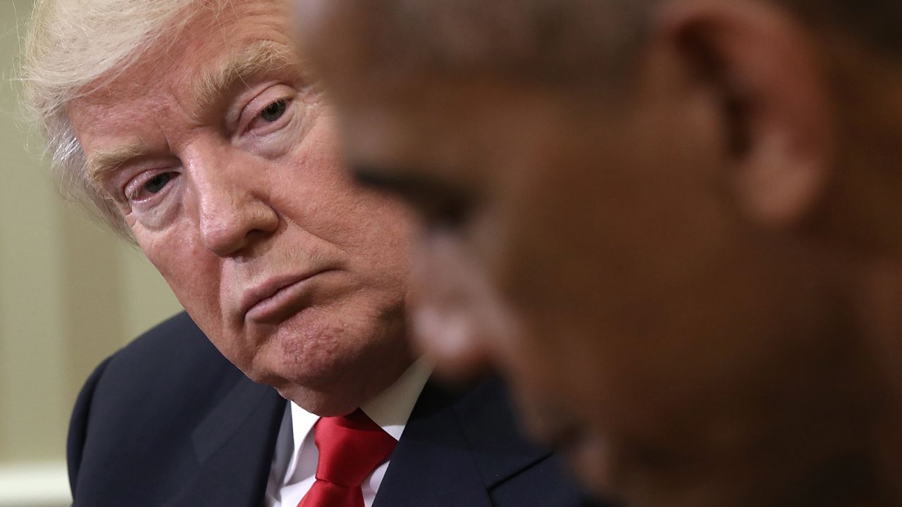 President Barack Obama speaks while meeting with then-President-elect Donald Trump following a meeting in the Oval Office November 10, 2016.